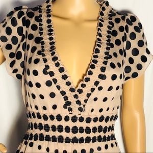 Plunge neckline camel and black polka dot dress